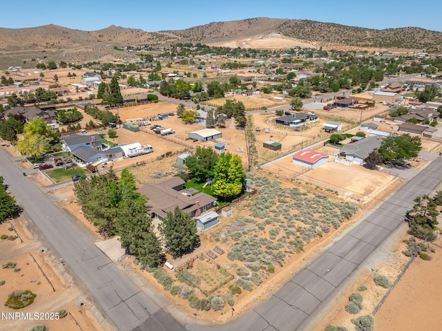 9100 Rain Dance Way, Reno, NV 89506 - aerial perspective of suburban area featuring a mountain backdrop and a desert landscape
