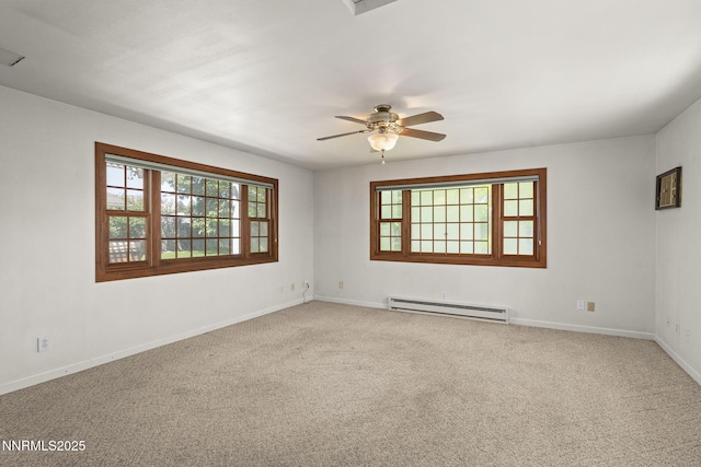 9100 Rain Dance Way, Reno, NV 89506 - carpeted empty room with a baseboard heating unit and ceiling fan