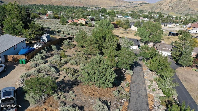 80 Bobcat Dr, Reno, NV 89523 - aerial overview of property's location with a mountainous background and nearby suburban area