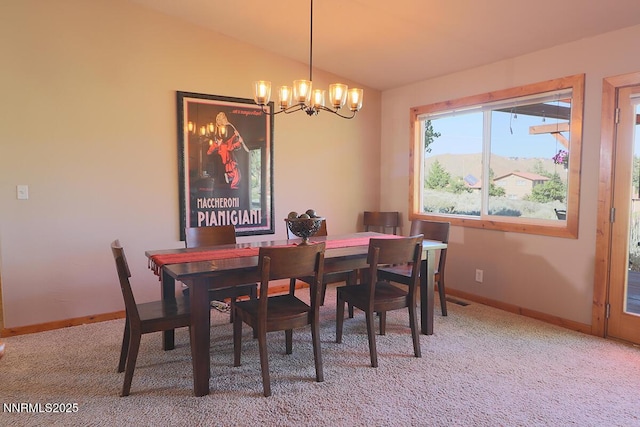 80 Bobcat Dr, Reno, NV 89523 - dining space with a chandelier, lofted ceiling, and light colored carpet