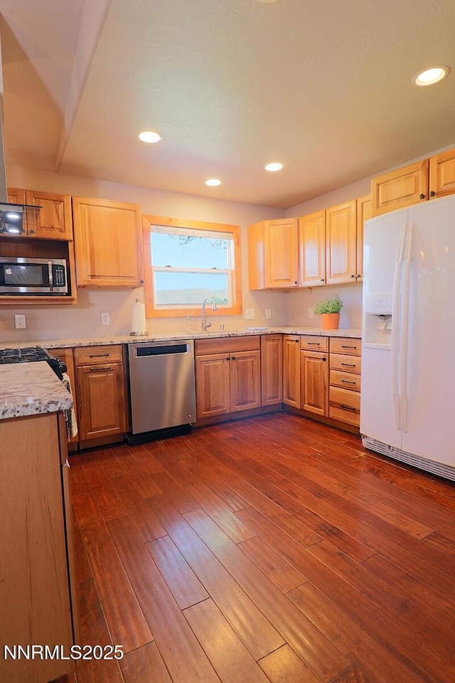 80 Bobcat Dr, Reno, NV 89523 - kitchen featuring appliances with stainless steel finishes, dark wood finished floors, recessed lighting, light brown cabinetry, and light stone counters