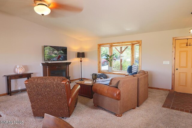 80 Bobcat Dr, Reno, NV 89523 - living area with carpet, vaulted ceiling, a fireplace, and a ceiling fan