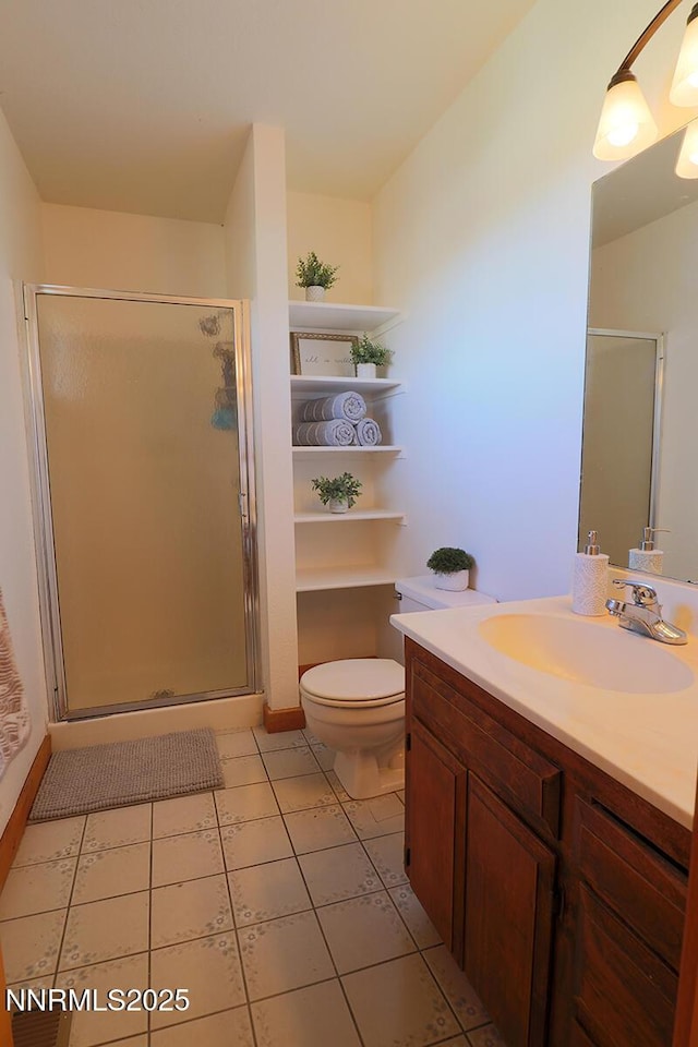 80 Bobcat Dr, Reno, NV 89523 - full bath with vanity, a stall shower, and tile patterned flooring
