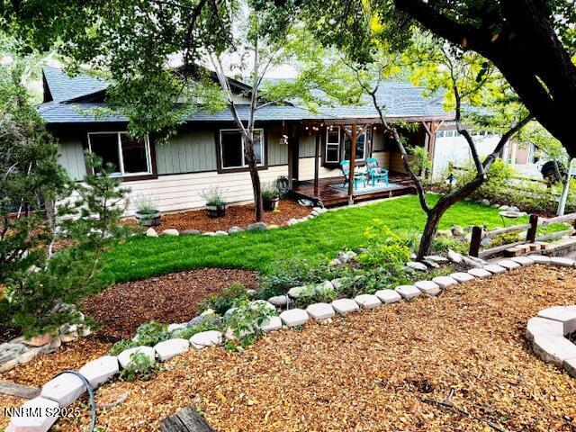 80 Bobcat Dr, Reno, NV 89523 - ranch-style house with a front lawn