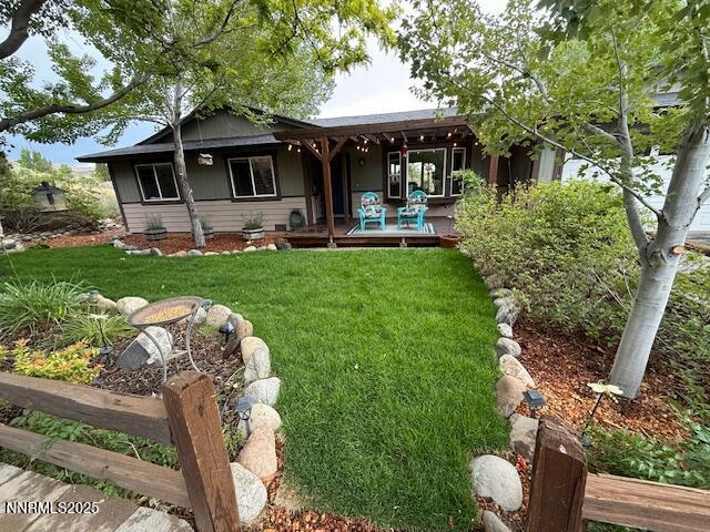 80 Bobcat Dr, Reno, NV 89523 - rear view of house with a yard and a porch