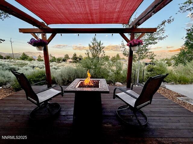 80 Bobcat Dr, Reno, NV 89523 - wooden terrace with a fire pit