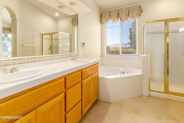 6993 Cinnamon Dr, Sparks, NV 89436 - bathroom featuring a stall shower, a bath, and double vanity
