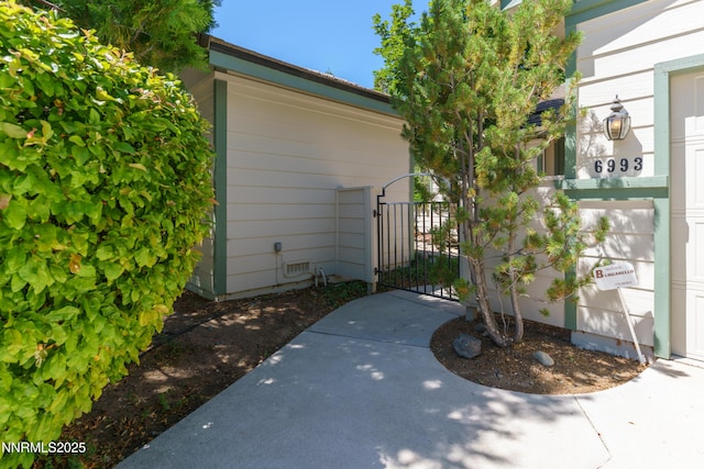 6993 Cinnamon Dr, Sparks, NV 89436 - view of home's exterior featuring a gate