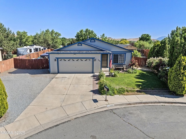 5886 Wishbone Ct, Sun Valley, NV 89433 - ranch-style home with concrete driveway and a garage