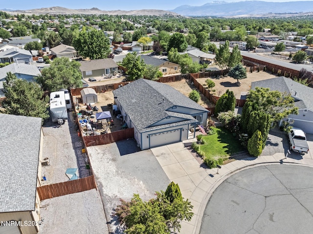 5886 Wishbone Ct, Sun Valley, NV 89433 - aerial perspective of suburban area with a mountainous background