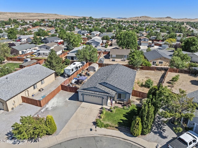 5886 Wishbone Ct, Sun Valley, NV 89433 - aerial perspective of suburban area with a mountainous background