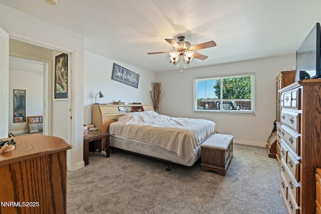 5886 Wishbone Ct, Sun Valley, NV 89433 - bedroom featuring light colored carpet and ceiling fan
