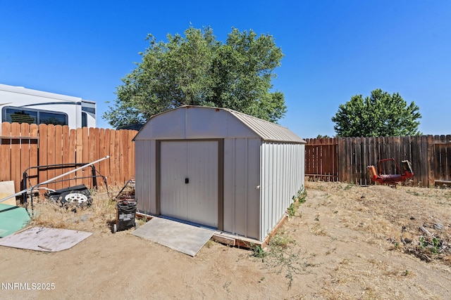 5886 Wishbone Ct, Sun Valley, NV 89433 - view of shed with a fenced backyard