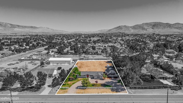 1314 Johnson Ln, Minden, NV 89423 - aerial perspective of suburban area featuring a mountainous background and property parcel outlined