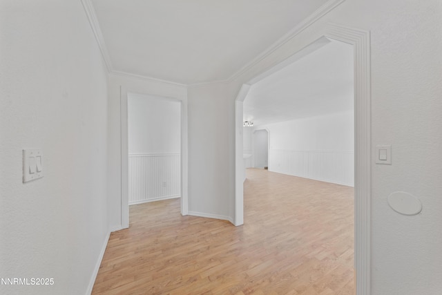 1314 Johnson Ln, Minden, NV 89423 - hall featuring arched walkways, crown molding, and light wood-style floors