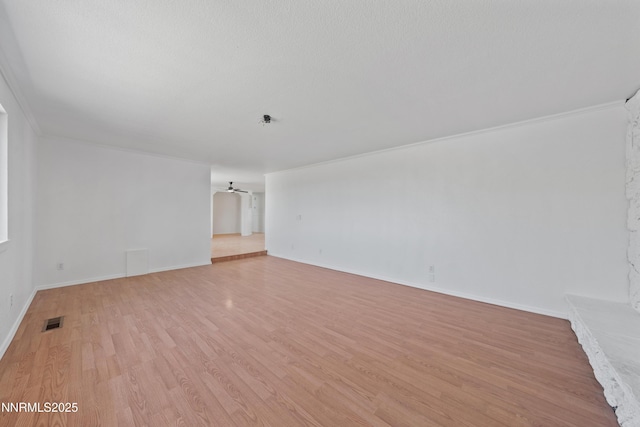 1314 Johnson Ln, Minden, NV 89423 - spare room with light wood-style flooring, ceiling fan, and crown molding