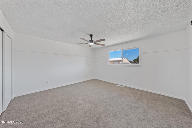 1314 Johnson Ln, Minden, NV 89423 - carpeted spare room with a textured ceiling and a ceiling fan