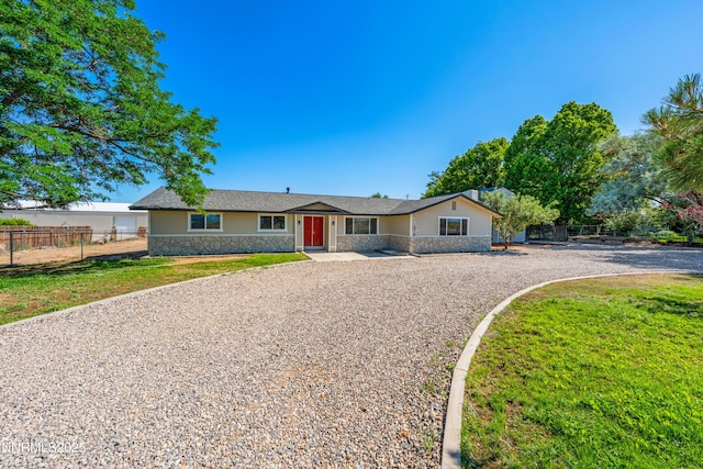 1314 Johnson Ln, Minden, NV 89423 - ranch-style home with stone siding