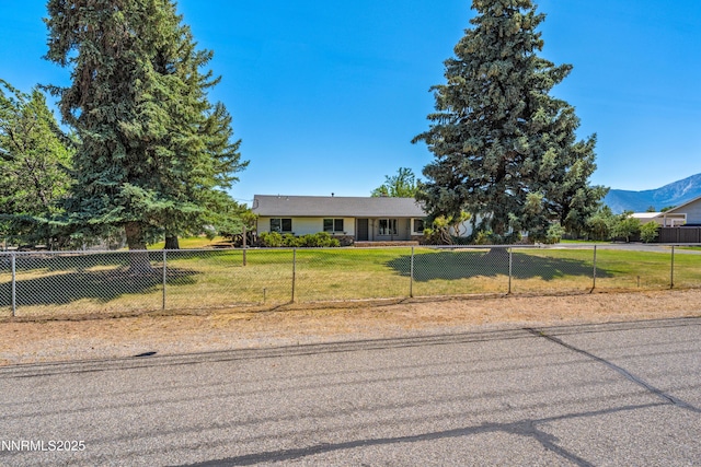 1513 S Riverview Dr, Gardnerville, NV 89460 - view of front of house featuring a fenced front yard and a mountain view