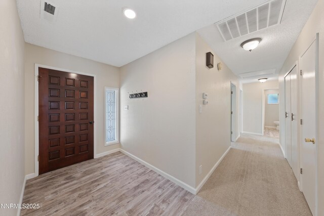 1513 S Riverview Dr, Gardnerville, NV 89460 - entryway featuring baseboards and light wood-style floors