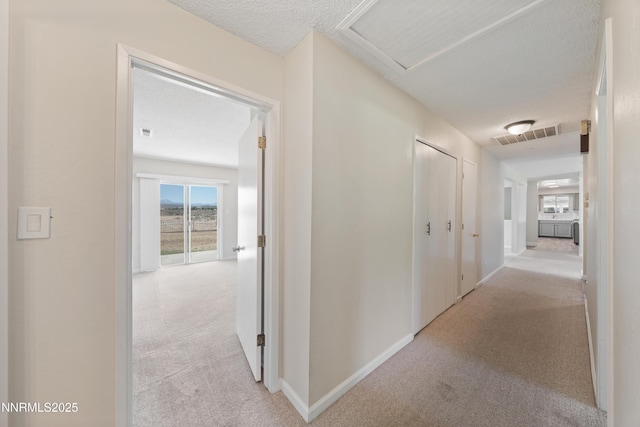 1513 S Riverview Dr, Gardnerville, NV 89460 - corridor with carpet and attic access
