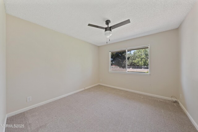 1513 S Riverview Dr, Gardnerville, NV 89460 - spare room with ceiling fan, carpet floors, and a textured ceiling