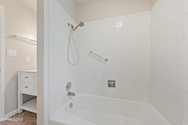 1513 S Riverview Dr, Gardnerville, NV 89460 - bathroom with tub / shower combination, vanity, and wood finished floors