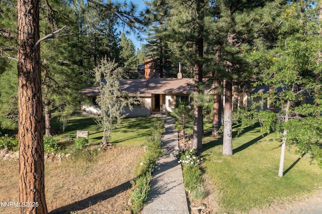 25 Yellow Pine Cir, Reno, NV 89511 - obstructed view of property featuring a front yard