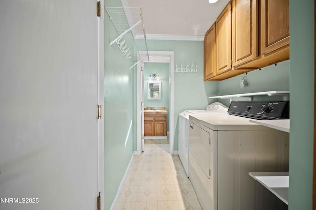 25 Yellow Pine Cir, Reno, NV 89511 - laundry area featuring washer and dryer, cabinet space, ornamental molding, and light flooring