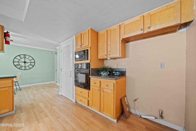 25 Yellow Pine Cir, Reno, NV 89511 - kitchen featuring black appliances, light wood-style flooring, dark countertops, and light brown cabinetry