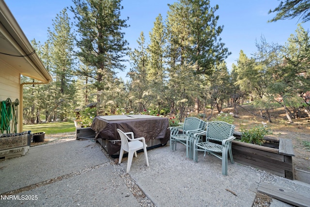 25 Yellow Pine Cir, Reno, NV 89511 - view of patio featuring view of wooded area and a hot tub