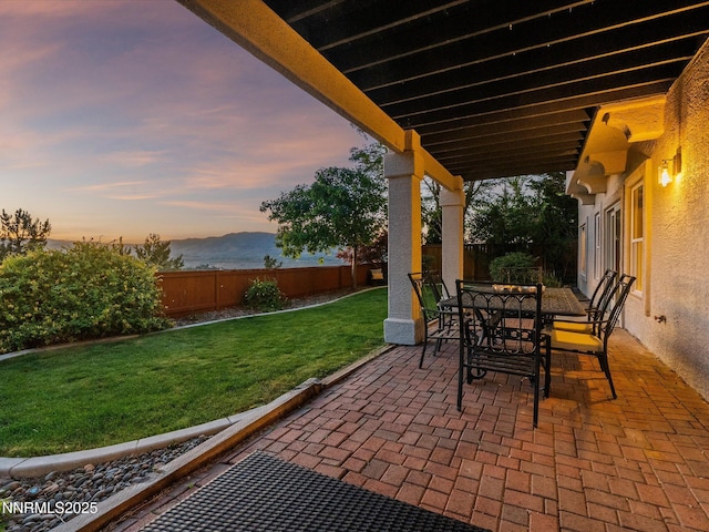 4721 W Creek Ridge Trl, Reno, NV 89519 - fenced backyard featuring a patio area, outdoor dining space, and a mountain view