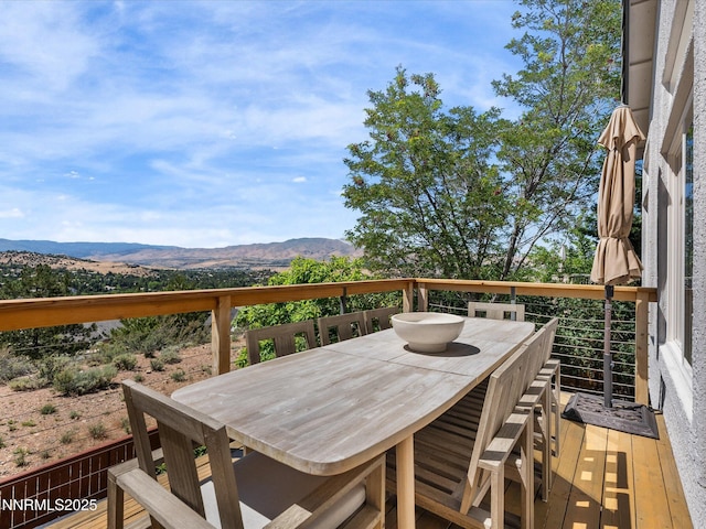 4721 W Creek Ridge Trl, Reno, NV 89519 - wooden deck featuring a mountain view and outdoor dining area