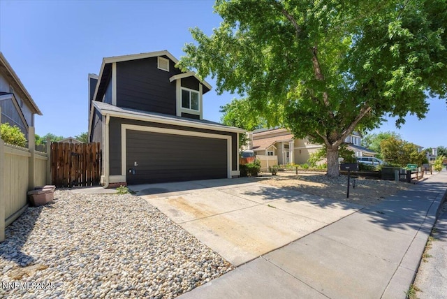 2719 Chavez Dr, Reno, NV 89502 - view of front of home with concrete driveway and an attached garage