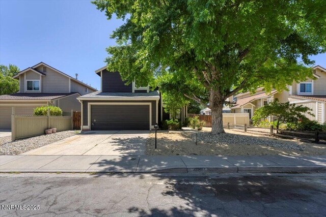 2719 Chavez Dr, Reno, NV 89502 - obstructed view of property with a garage and driveway