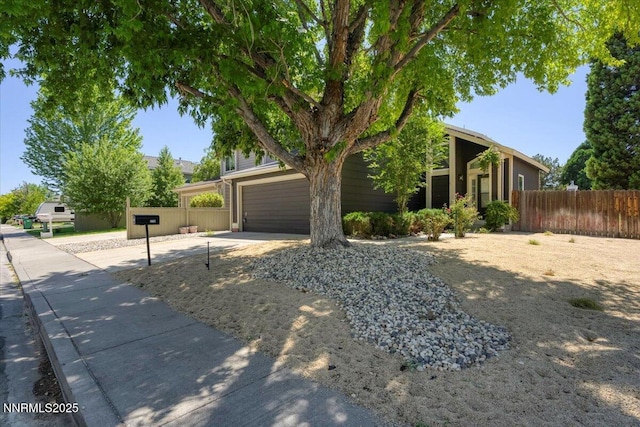 2719 Chavez Dr, Reno, NV 89502 - view of front of home with concrete driveway and a garage