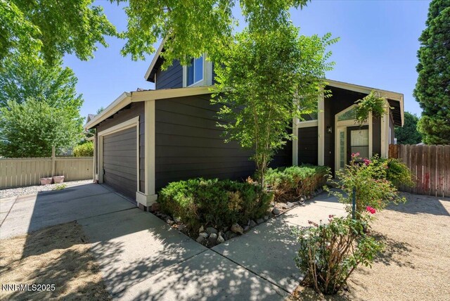 2719 Chavez Dr, Reno, NV 89502 - view of front of home with a garage and concrete driveway