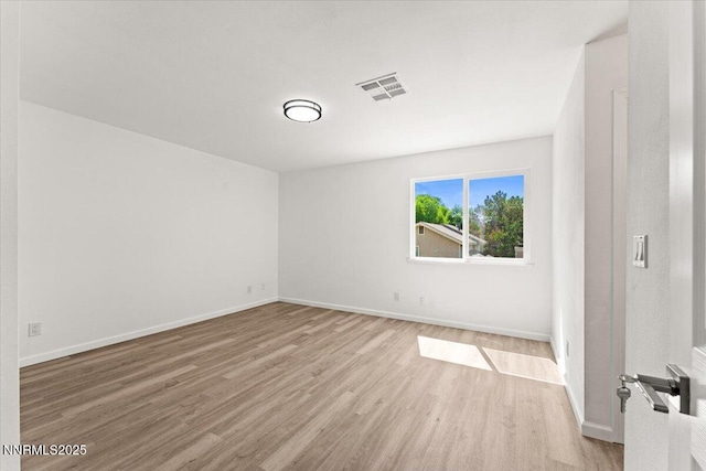 2719 Chavez Dr, Reno, NV 89502 - spare room with wood finished floors and baseboards