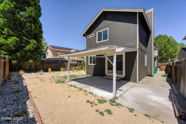 2719 Chavez Dr, Reno, NV 89502 - back of house featuring a patio area and a fenced backyard