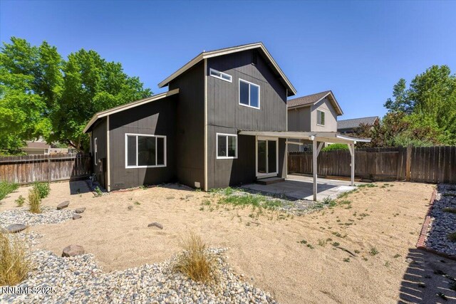 2719 Chavez Dr, Reno, NV 89502 - back of house featuring a patio and a fenced backyard