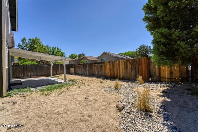 2719 Chavez Dr, Reno, NV 89502 - fenced backyard featuring a patio