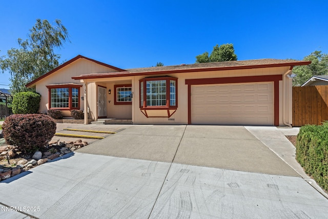 2095 Kings Row, Reno, NV 89503 - single story home featuring driveway and an attached garage