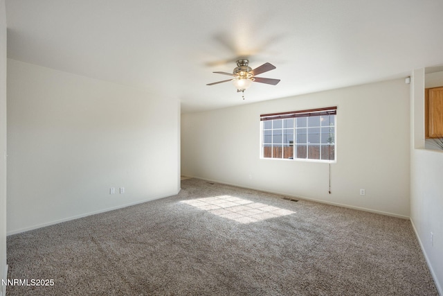 8733 Sunset Breeze Dr, Reno, NV 89506 - carpeted spare room with a ceiling fan and baseboards