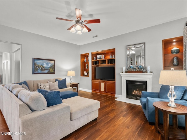 1486 Lambrays Ct, Sparks, NV 89436 - living room with a ceiling fan, dark wood-style flooring, and a glass covered fireplace