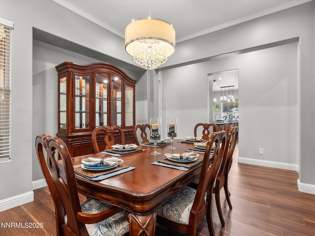 1486 Lambrays Ct, Sparks, NV 89436 - dining area with a chandelier, wood finished floors, and ornamental molding