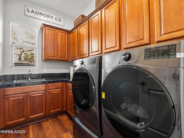 1486 Lambrays Ct, Sparks, NV 89436 - laundry area featuring cabinet space, washer and dryer, and dark wood-style floors