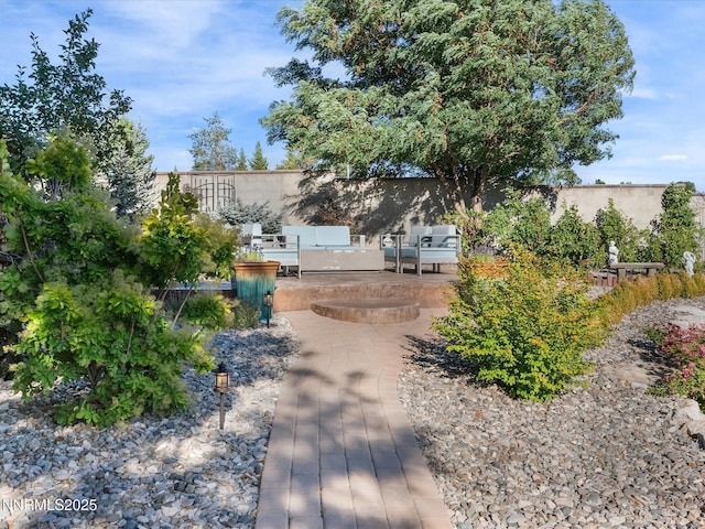1486 Lambrays Ct, Sparks, NV 89436 - view of front of home featuring stucco siding, a patio, and an outdoor living space