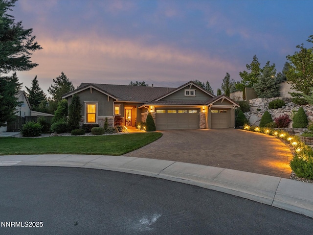 1486 Lambrays Ct, Sparks, NV 89436 - craftsman inspired home with stone siding, a garage, driveway, and a yard