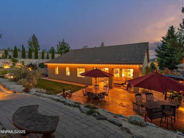 1486 Lambrays Ct, Sparks, NV 89436 - rear view of house featuring a patio area and outdoor dining space