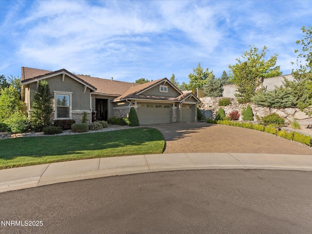 1486 Lambrays Ct, Sparks, NV 89436 - view of front of property with a garage, driveway, stone siding, a front yard, and stucco siding